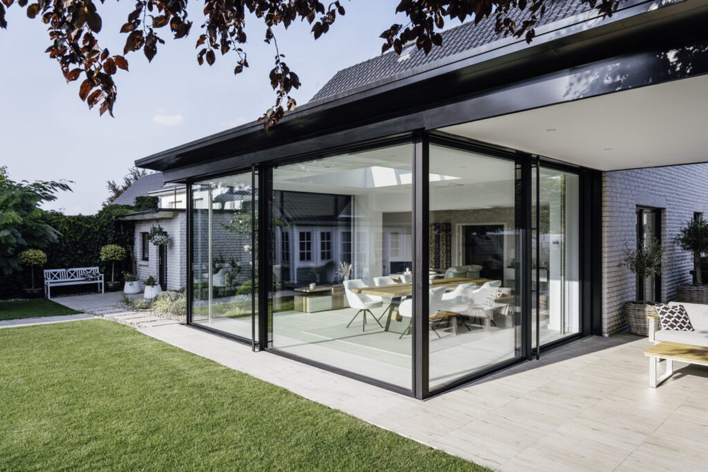 Véranda en aluminium avec baies vitrées coulissantes